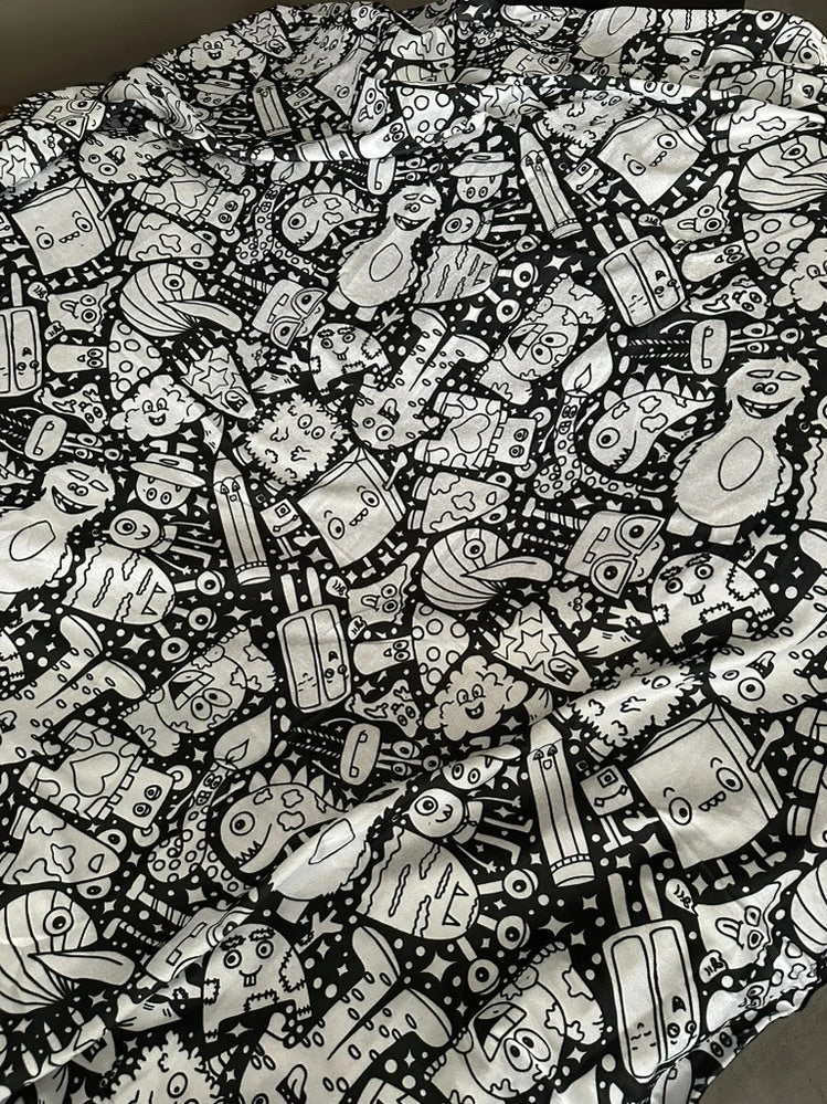 Black and white doodle colouring blanket